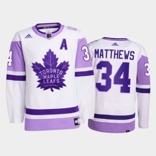 Auston Matthews #34 Toronto Maple Leafs 2021 Hockey Fights Cancer White Primegreen Jersey